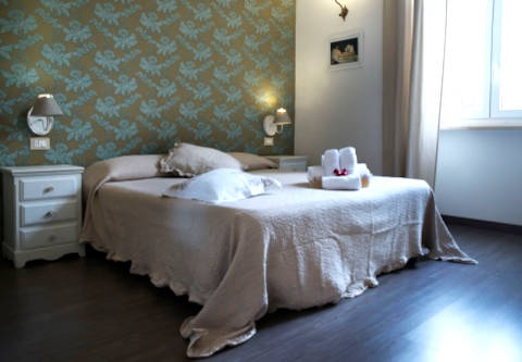 Photo AFFITTACAMERE GUEST HOUSE CASA VICENZA a ROMA