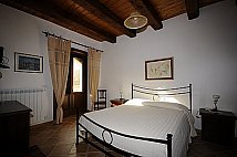 B&b Casa Vacanze Corneto - foto 5 (L'ampia Stanza Da Letto Dell'appartamento )