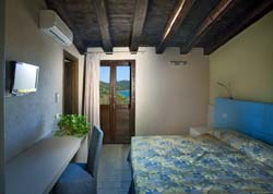 Photo HOTEL APPARTAMENTI LISCIA COUNTRY RELAIS a LURAS