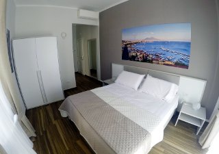 Foto AFFITTACAMERE ROOMS STAZIONE CENTRALE di NAPOLI